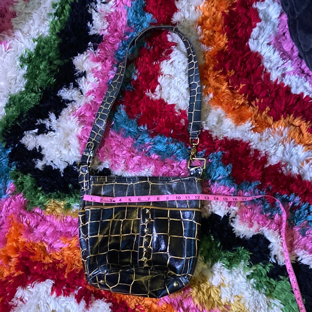 Maya Moon black alligator bucket bag with adjustable strap